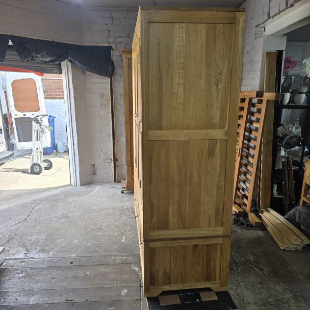 Explore the Pre-Owned Oak FurnitureLand Bevel Triple Wardrobe in Solid Oak Explore the Pre-Owned Oak FurnitureLand Bevel Triple Wardrobe in Solid Oak