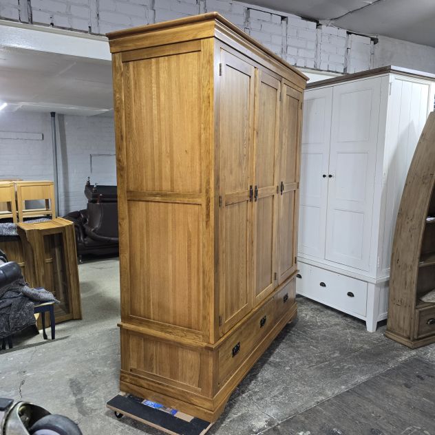 Peek inside its story... then write your own chapter with this stunning second-hand French Farmhouse Rustic Solid Oak Triple Wardrobe. Peek inside its story... then write your own chapter with this stunning second-hand French Farmhouse Rustic Solid Oak Triple Wardrobe.