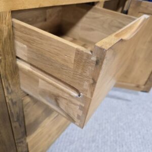 Peek inside its story... then write your own chapter with this pre-loved Oak Furniture land Orrick Solid Oak Sideboard. Peek inside its story... then write your own chapter with this pre-loved Oak Furniture land Orrick Solid Oak Sideboard.