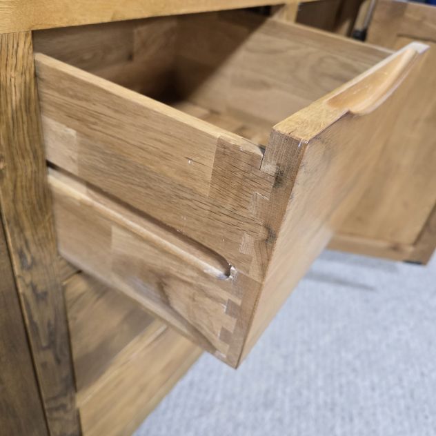 Peek inside its story... then write your own chapter with this pre-loved Oak Furniture land Orrick Solid Oak Sideboard. Peek inside its story... then write your own chapter with this pre-loved Oak Furniture land Orrick Solid Oak Sideboard.