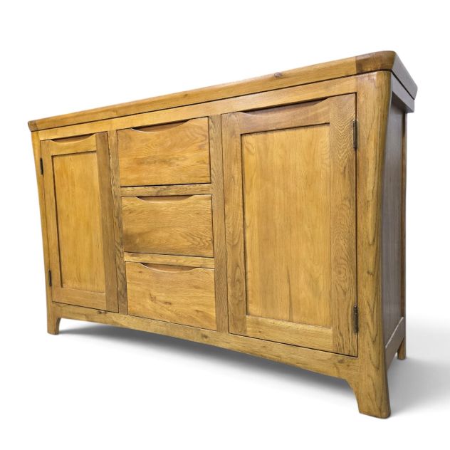 Peek inside its story... then write your own chapter with this pre-loved Oak Furniture land Orrick Solid Oak Sideboard. Peek inside its story... then write your own chapter with this pre-loved Oak Furniture land Orrick Solid Oak Sideboard.