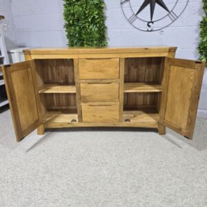 Peek inside its story... then write your own chapter with this pre-loved Oak Furniture land Orrick Solid Oak Sideboard. Peek inside its story... then write your own chapter with this pre-loved Oak Furniture land Orrick Solid Oak Sideboard.