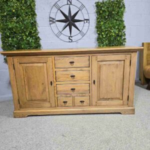 Explore the rustic elegance of this PreLoved Barker and Stonehouse French oak sideboard. Save 89% and enjoy luxury at a fraction of the cost. Explore the rustic elegance of this PreLoved Barker and Stonehouse French oak sideboard. Save 89% and enjoy luxury at a fraction of the cost.