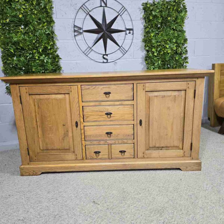 Explore the rustic elegance of this PreLoved Barker and Stonehouse French oak sideboard. Save 89% and enjoy luxury at a fraction of the cost. Explore the rustic elegance of this PreLoved Barker and Stonehouse French oak sideboard. Save 89% and enjoy luxury at a fraction of the cost.