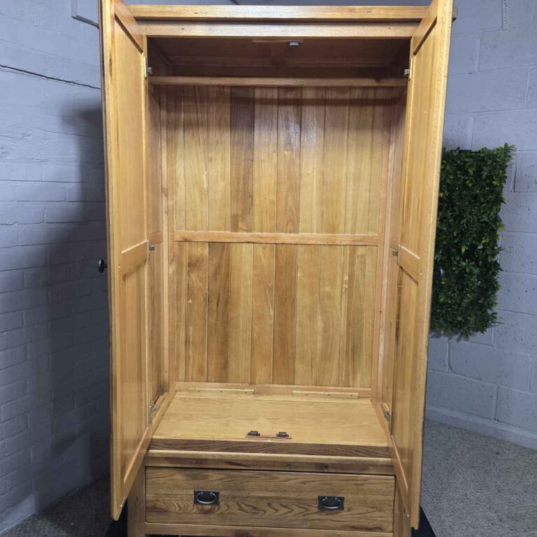 Explore the timeless quality of this pre-owned Barker and Stonehouse double wardrobe in solid oak Explore the timeless quality of this pre-owned Barker and Stonehouse double wardrobe in solid oak