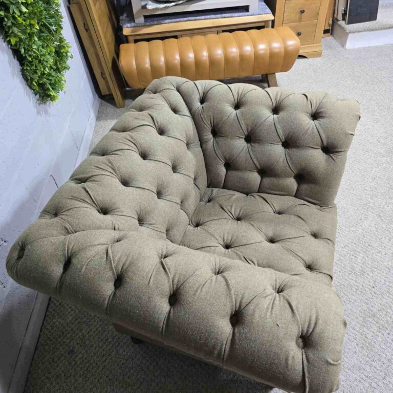 Explore the elegance of this pre-loved Barker and Stonehouse Chesterfield armchair with brass castors and deep button tufting Explore the elegance of this pre-loved Barker and Stonehouse Chesterfield armchair with brass castors and deep button tufting