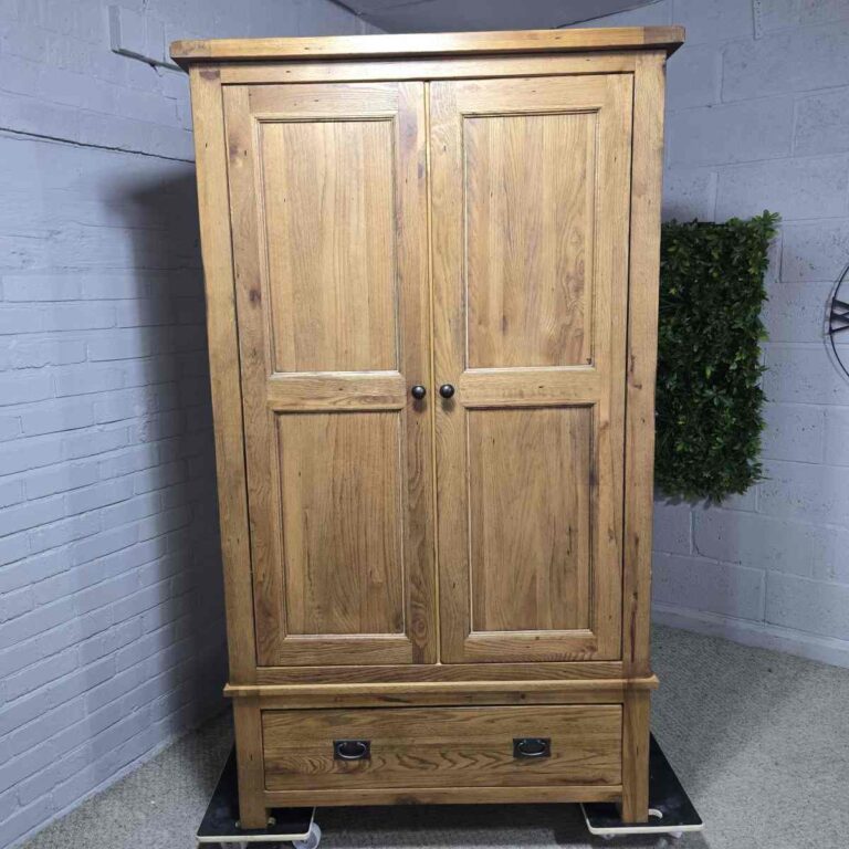 Explore the timeless quality of this pre-owned Barker and Stonehouse double wardrobe in solid oak Explore the timeless quality of this pre-owned Barker and Stonehouse double wardrobe in solid oak