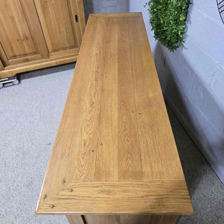 Explore the rustic elegance of this PreLoved Barker and Stonehouse French oak sideboard. Save 89% and enjoy luxury at a fraction of the cost. Explore the rustic elegance of this PreLoved Barker and Stonehouse French oak sideboard. Save 89% and enjoy luxury at a fraction of the cost.
