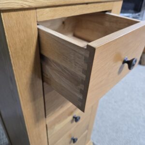 Explore the elegance of this pre-loved Barker and Stonehouse solid oak tallboy with five drawers. Perfect for stylish and practical storage. Explore the elegance of this pre-loved Barker and Stonehouse solid oak tallboy with five drawers. Perfect for stylish and practical storage.