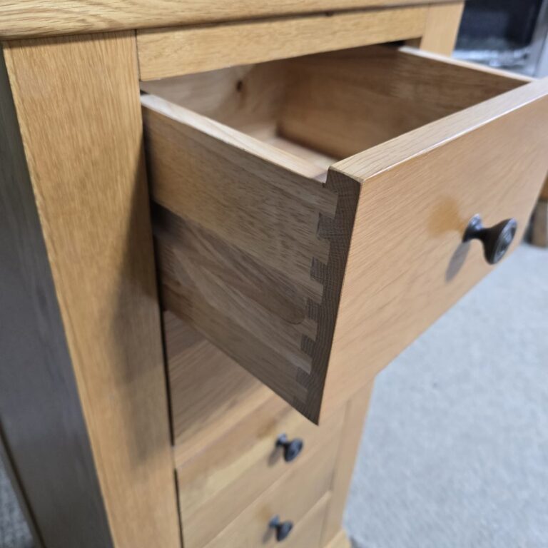 Explore the elegance of this pre-loved Barker and Stonehouse solid oak tallboy with five drawers. Perfect for stylish and practical storage. Explore the elegance of this pre-loved Barker and Stonehouse solid oak tallboy with five drawers. Perfect for stylish and practical storage.