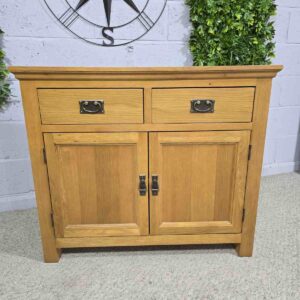 Peek inside its story... then write your own chapter with this pre-loved solid oak sideboard. Peek inside its story... then write your own chapter with this pre-loved solid oak sideboard.