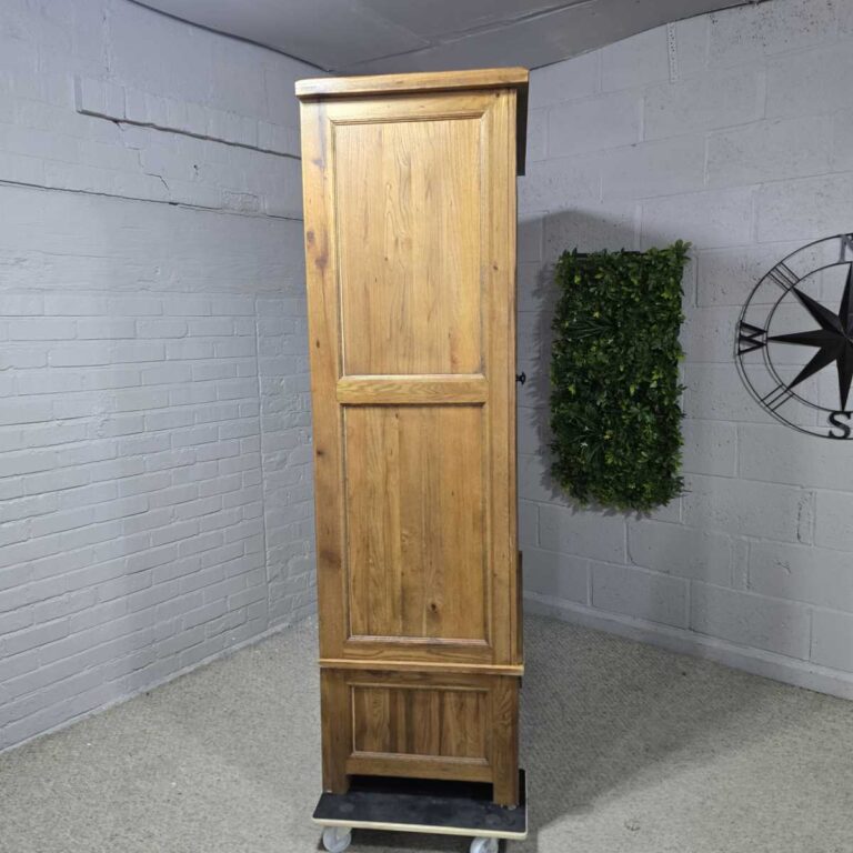 Explore the timeless quality of this pre-owned Barker and Stonehouse double wardrobe in solid oak Explore the timeless quality of this pre-owned Barker and Stonehouse double wardrobe in solid oak