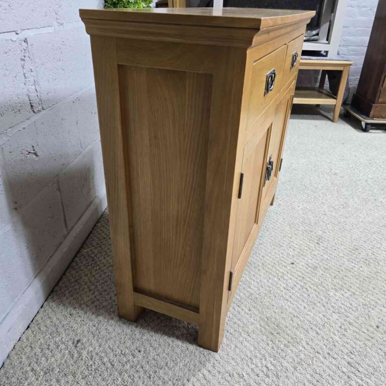 Peek inside its story... then write your own chapter with this pre-loved solid oak sideboard. Peek inside its story... then write your own chapter with this pre-loved solid oak sideboard.