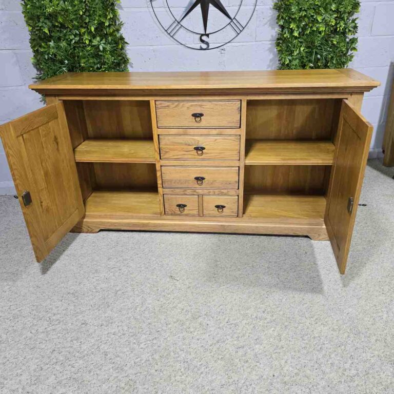 Explore the rustic elegance of this PreLoved Barker and Stonehouse French oak sideboard. Save 89% and enjoy luxury at a fraction of the cost. Explore the rustic elegance of this PreLoved Barker and Stonehouse French oak sideboard. Save 89% and enjoy luxury at a fraction of the cost.