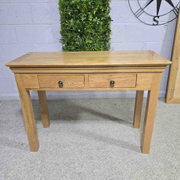 Elevate your hallway with this PreLoved Barker and Stonehouse solid oak console table. Dovetail joints and smooth pulls make it a practical and elegant choice. Elevate your hallway with this PreLoved Barker and Stonehouse solid oak console table. Dovetail joints and smooth pulls make it a practical and elegant choice.