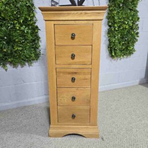 Explore the elegance of this pre-loved Barker and Stonehouse solid oak tallboy with five drawers. Perfect for stylish and practical storage. Explore the elegance of this pre-loved Barker and Stonehouse solid oak tallboy with five drawers. Perfect for stylish and practical storage.