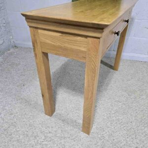 Elevate your hallway with this PreLoved Barker and Stonehouse solid oak console table. Dovetail joints and smooth pulls make it a practical and elegant choice. Elevate your hallway with this PreLoved Barker and Stonehouse solid oak console table. Dovetail joints and smooth pulls make it a practical and elegant choice.