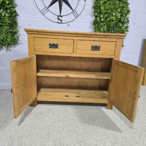 Peek inside its story... then write your own chapter with this pre-loved solid oak sideboard. Peek inside its story... then write your own chapter with this pre-loved solid oak sideboard.